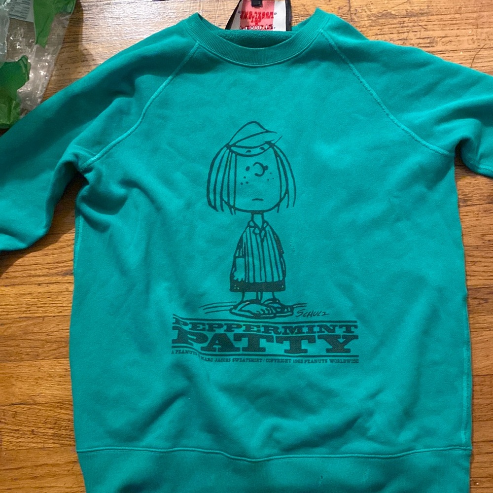 Marc jacobs limited edition of the peanuts gang sweatshirt.